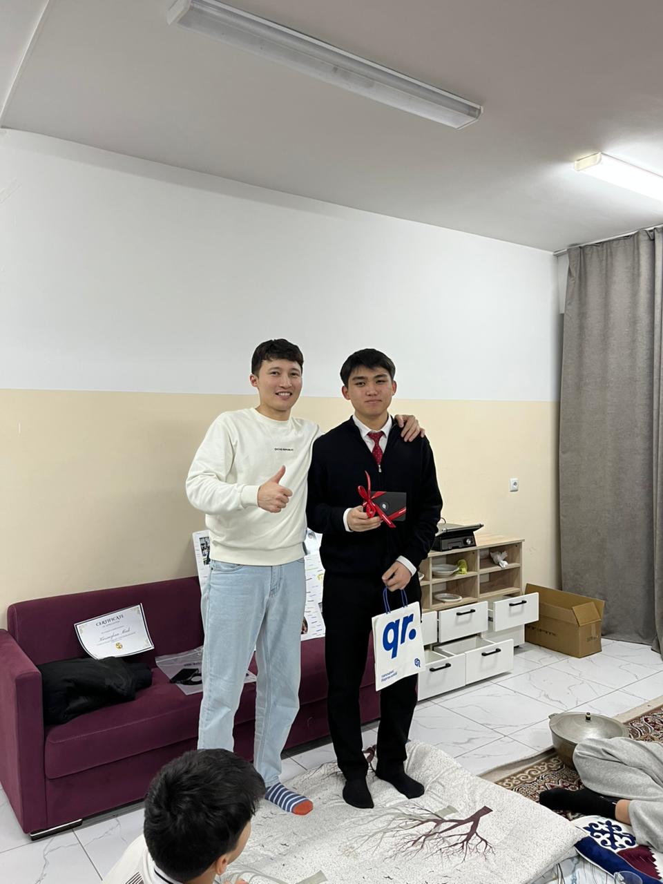 Teacher and class photo